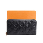 Black Monogram Embossed Leather Coussin Zippy Wallet w/ Box