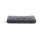 Black Monogram Embossed Leather Coussin Zippy Wallet w/ Box