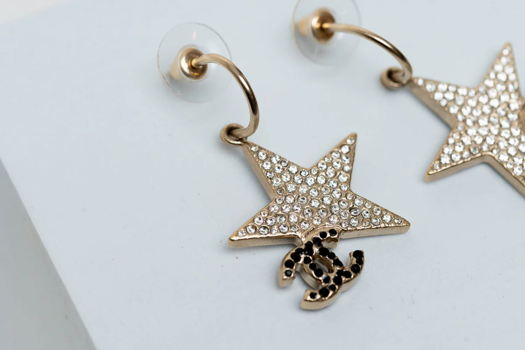 Gold-Tone Star Earrings with Crystal Embellishments and CC Logo