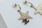 Gold-Tone Star Earrings with Crystal Embellishments and CC Logo