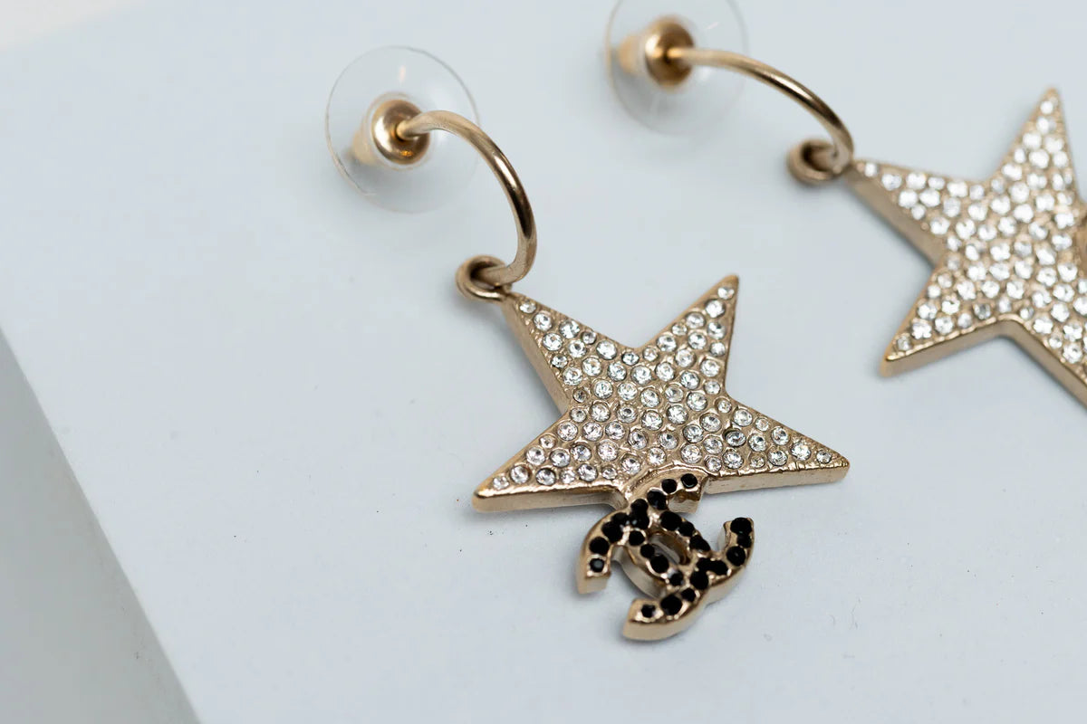 Gold-Tone Star Earrings with Crystal Embellishments and CC Logo