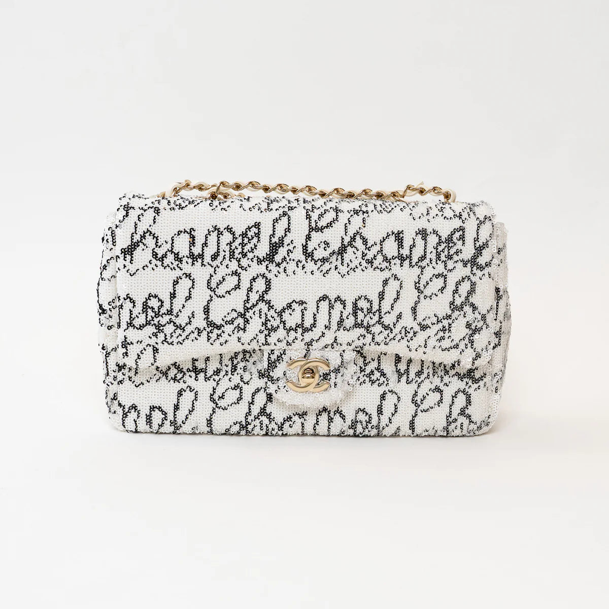 Pre-Loved Chanel™ White and Black Sequin Logo Flap Bag Coeur Cult Core