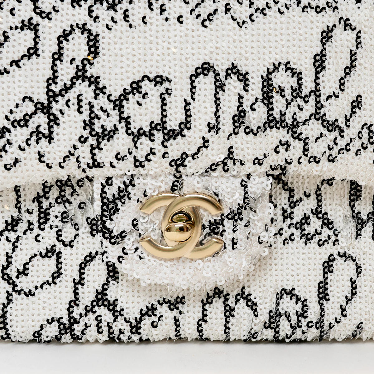 Pre-Loved Chanel™ White and Black Sequin Logo Flap Bag Coeur Cult Core