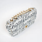 Pre-Loved Chanel™ White and Black Sequin Logo Flap Bag Coeur Cult Core