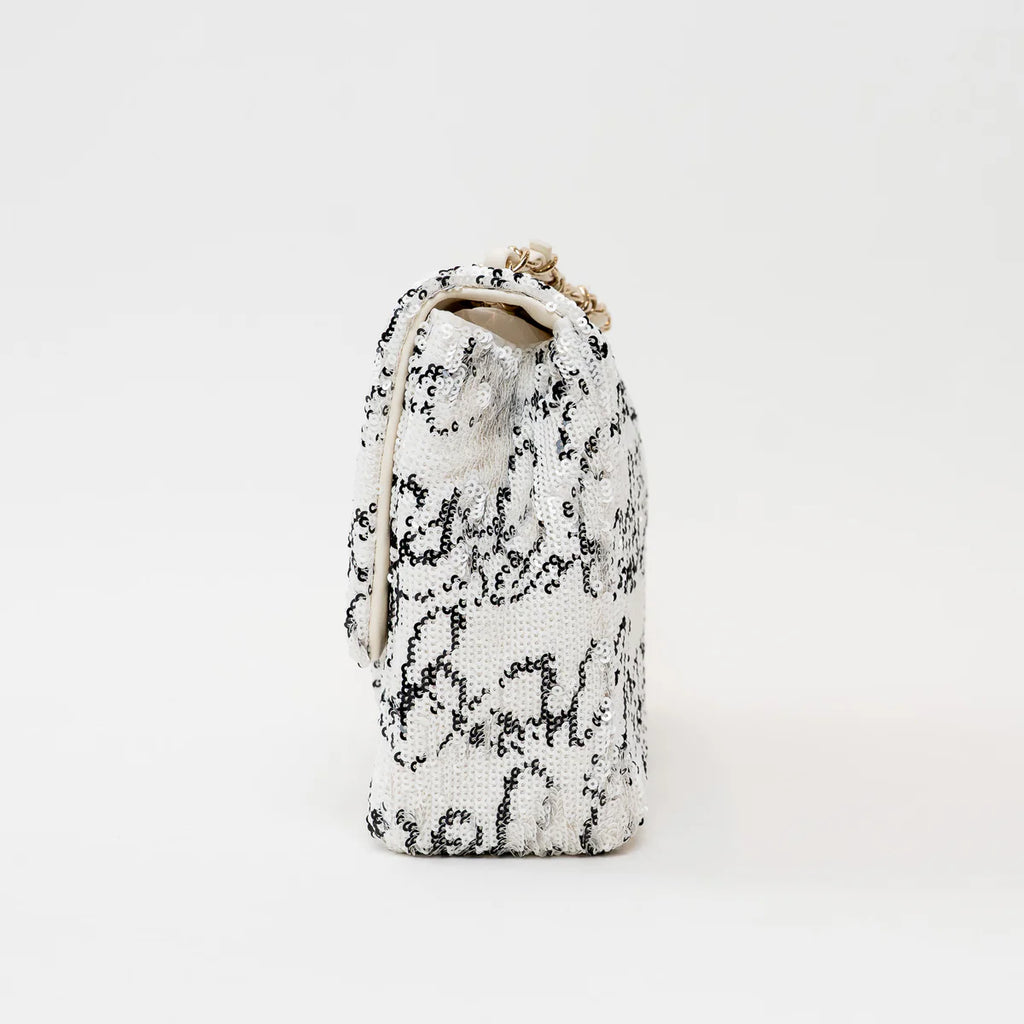 Pre-Loved Chanel™ White and Black Sequin Logo Flap Bag Coeur Cult Core
