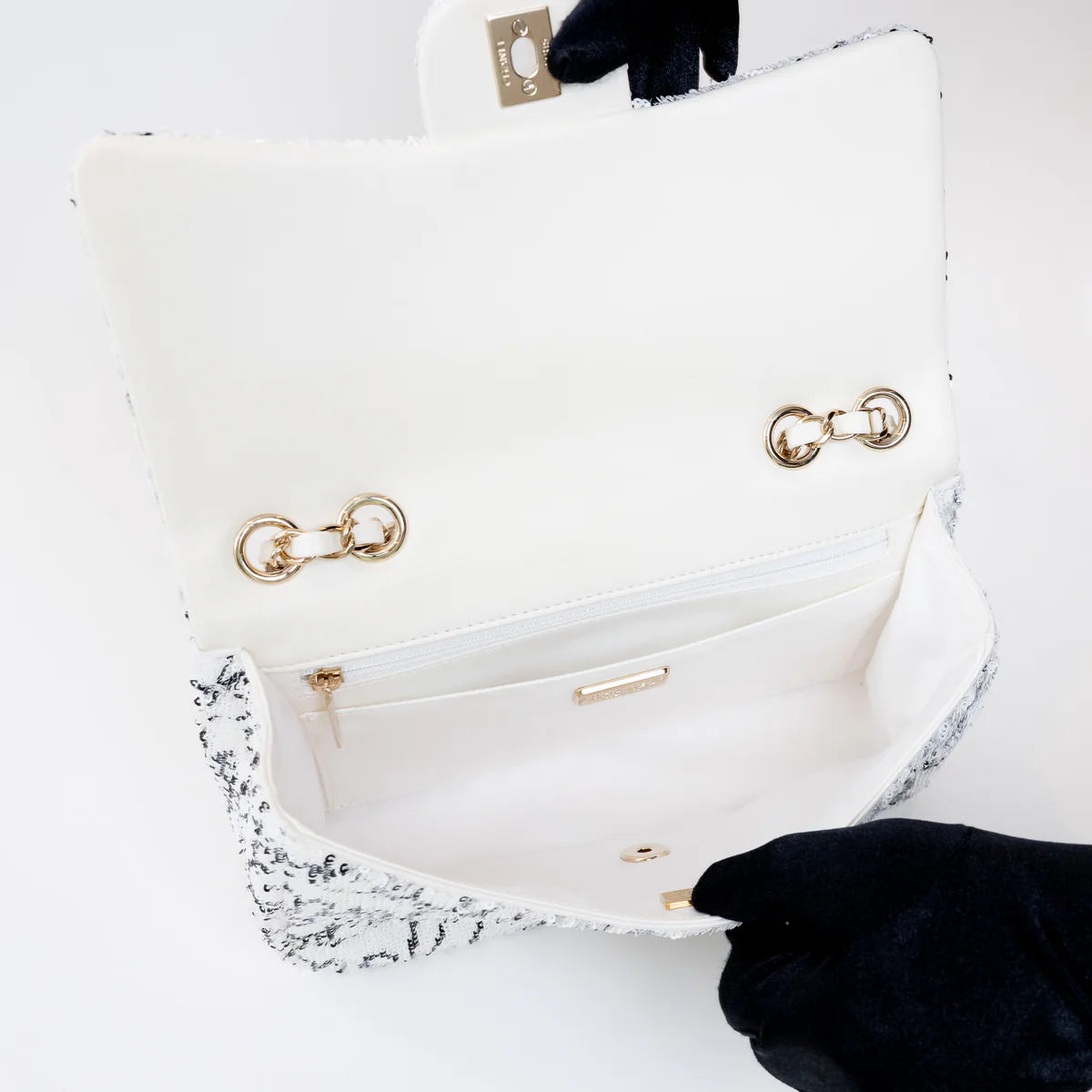 Pre-Loved Chanel™ White and Black Sequin Logo Flap Bag Coeur Cult Core