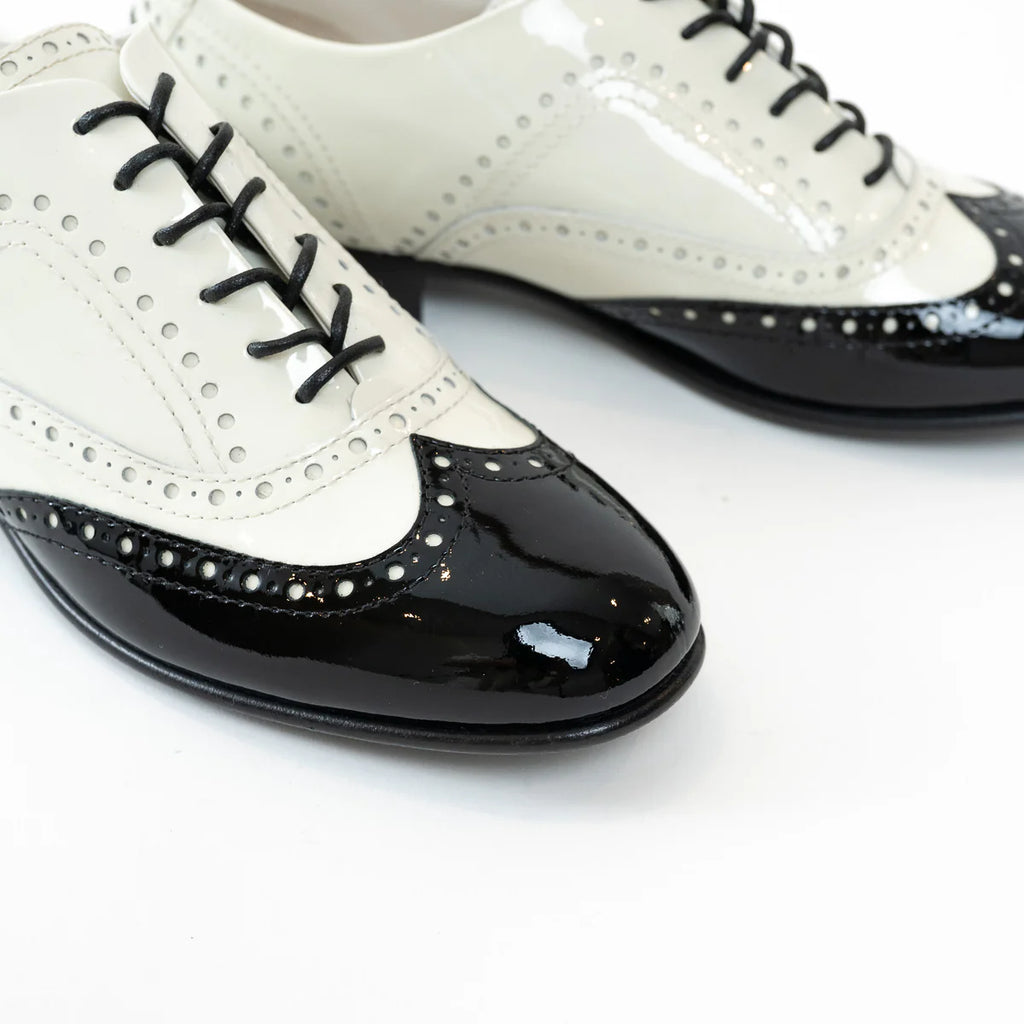 Pre-Loved Chanel™ White and Black Patent Leather Loafers Size 38.5 Coeur Cult Core