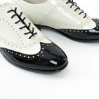 Pre-Loved Chanel™ White and Black Patent Leather Loafers Size 38.5 Coeur Cult Core