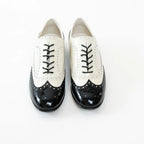 Pre-Loved Chanel™ White and Black Patent Leather Loafers Size 38.5 Coeur Cult Core