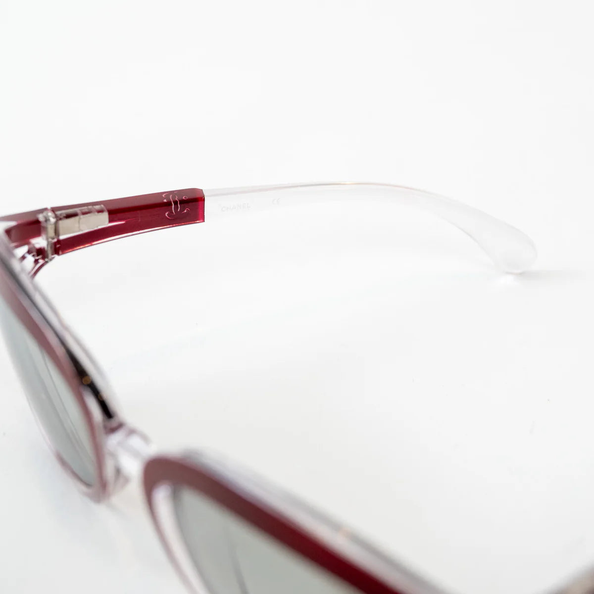 Pre-Loved Chanel™ Clear Cateye Sunglasses with Red Accents Coeur Cult Core