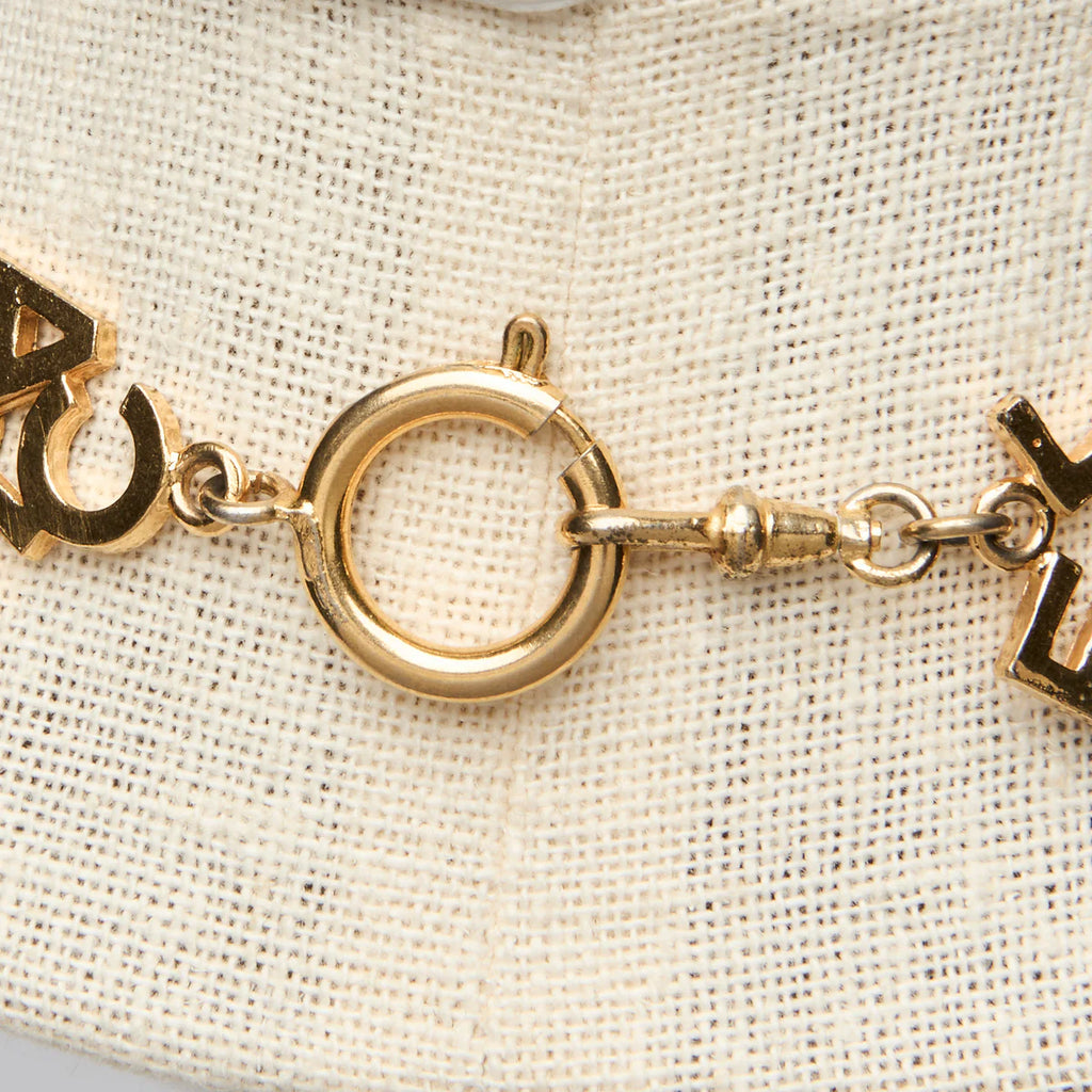 Pre-Loved Chanel ™ Gold Logo Choker Necklace Coeur Cult Core
