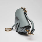 Blue Dove Grey Grained Calfskin Leather Mini Saddle Handbag